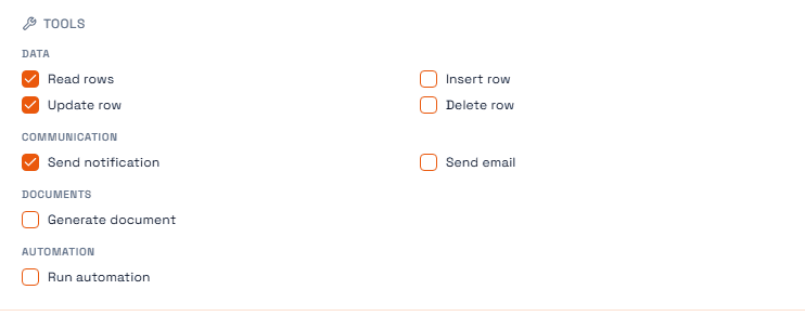 An agent's tools, grouped by category, with the granted ones ticked and its role shown on the left.